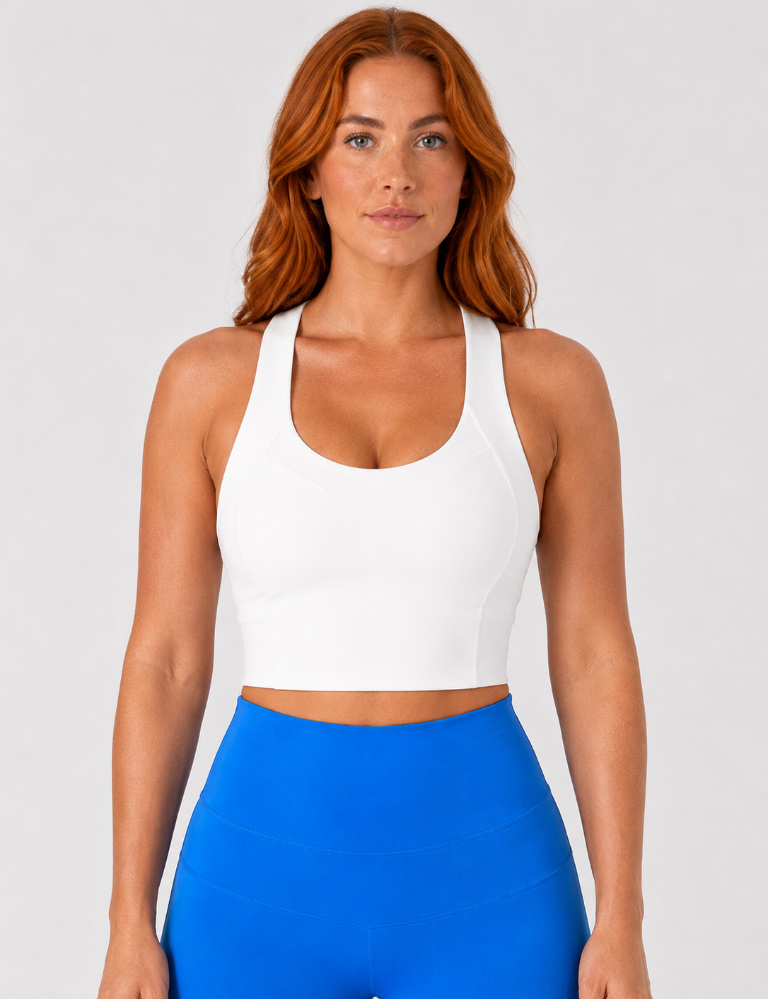 Model wearing Sculp crop top, front view, from Style Luxe Activewear in white 