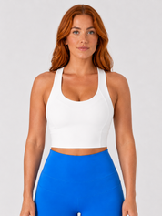 Model wearing Sculp crop top, front view, from Style Luxe Activewear in white 