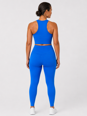 Back view of style luxe electricave high-waist blue leggings on model