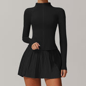 Woman wearing black women’s workout jacket running outdoors – Style Luxe